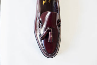 MOCASIN DE PIEL BORLAS BURDEOS.