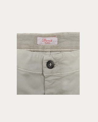 Beviá beige chino shorts made from cotton with elastane for comfort and movement. Features a button closure.